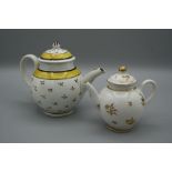 An 18th century Staffordshire creamware miniature teapot, polychrome decorated with floral sprigs