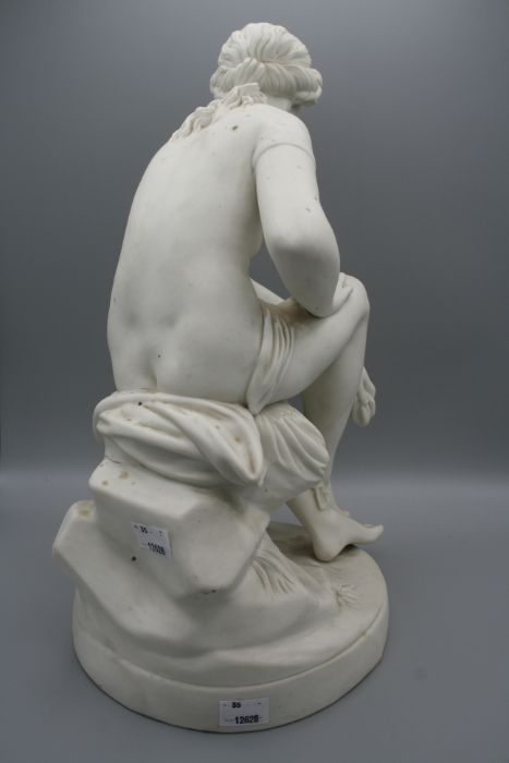 A 19th century English parian figure of a female nude, seated upon a rock, drying with a robe, - Bild 4 aus 12