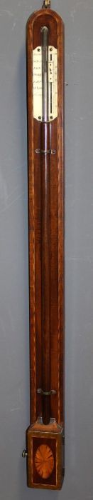 An early 19th century mahogany stick barometer, crossbanded case with patera inlaid cistern cover,