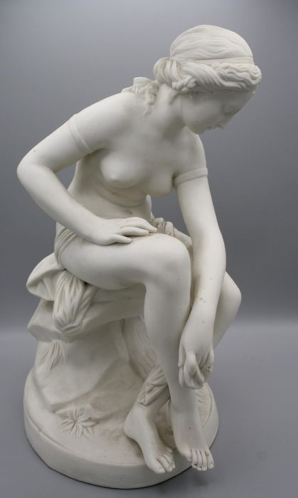 A 19th century English parian figure of a female nude, seated upon a rock, drying with a robe, - Bild 12 aus 12