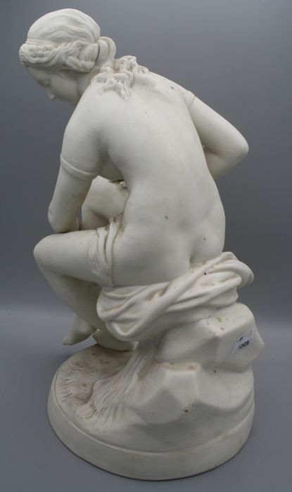 A 19th century English parian figure of a female nude, seated upon a rock, drying with a robe, - Bild 3 aus 12