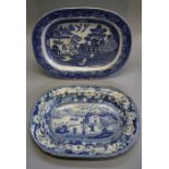 An early 19th century blue and white pottery meat platter printed with Oriental figures in an