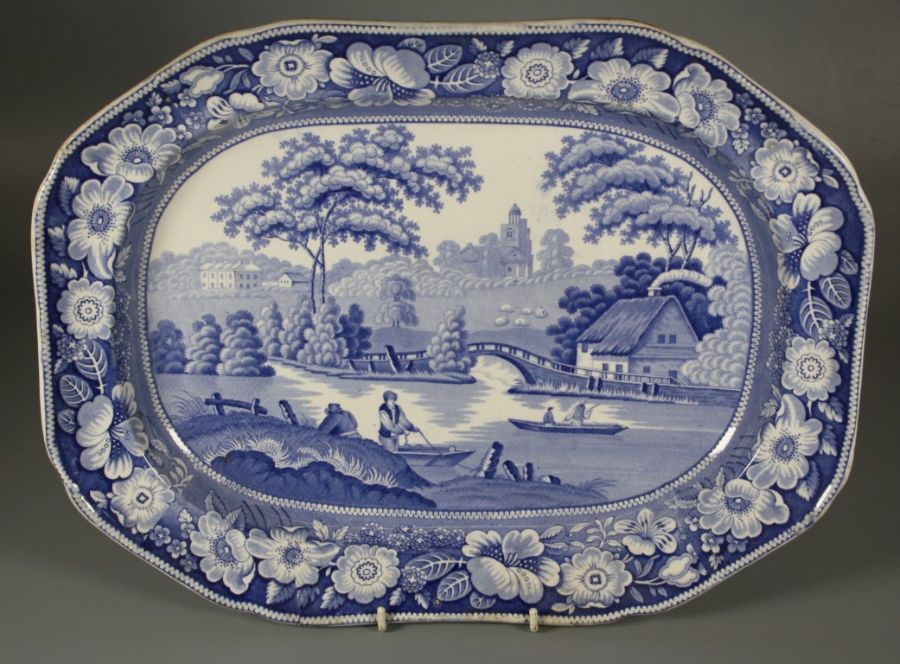 An early 19th century blue and white pottery meat platter, printed with Wild Rose pattern, 32 x