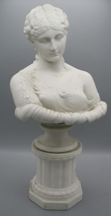 A 19th century English parian bust of Clytie, emerging from a sunflower, on spreading socle and