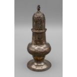 Thomas Shepherd, a George III silver sugar caster of bellied form, flame finial with pierced