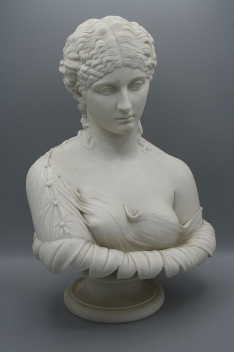 A 19th century English parian bust of Clytie, emerging from a sunflower. Maroon printed marks ' O