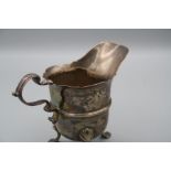 George Hodder, a mid 18th century Irish silver cream jug with everted rim and flying scroll
