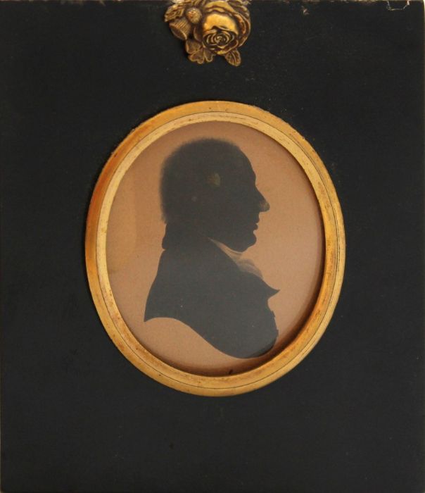 An early 19th century silhouette profile portrait of a Gentleman. Inscribed verso ' Rev Oswald