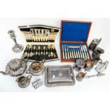 A collection of assorted EPNS to include: candlestick, cutlery, toast racks, tea set and others