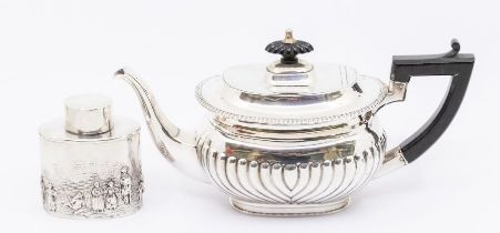 An Edwardian silver tea caddy and cover, the lower section chased and repousse with pastoral scene