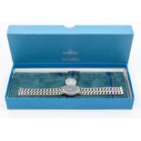 Omega- a ladies silver Omega de Ville wristwatch, comprising dark blue oval dial, with white Roman