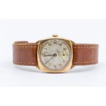 A gents 9ct gold  Avia wristwatch, circa 1930's cushion shaped case with round silvered dial, gold