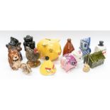 A collection of mid to late 20th Century money boxes, mixed selection