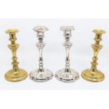 Pair of Victorian Elkington silver plated candlesticks and a pair of Victorian brass candlesticks,