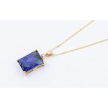 A 9k gold, synthetic sapphire and diamond pendant necklace, gross weight approx 4.2gms