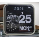 A 1980/90s auto calendar Quartz wall clock