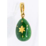 Faberge- an limited edition 18ct gold and green guilloche enamel egg pendant/charm, inset with