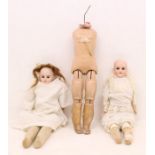 Dolls: A pair of bisque head / shoulder plate dolls, one by the Ernst Heubach, the other Armand