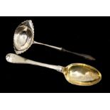 A large 19th Century Continental silver serving spoon, stamped to terminal (124.6 grams) and a