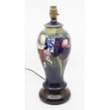 A mid 20th Century Moorcroft vase, converted to a lamp does have a hairline crack to body