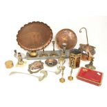 A collection of brass copper wares including candlesticks, trays, kettle, vintage tins etc