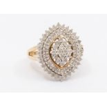 A diamond and 9ct gold cluster ring, navette shaped cluster set with round brilliant cut diamonds to