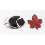 Meka - two Modernist Danish silver and enamel brooches, comprising a red enamel leaf brooch, size