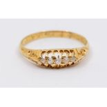 A five stone diamond and 18ct gold ring, boat head setting, ring engraved 23/12/1905, size Q,