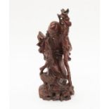 A Chinese hardwood figure of deity/God