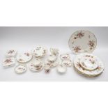 A Royal Crown Derby Posie pattern collection including six dinner plates, two trio's, comport,