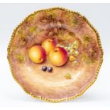 A Royal Worcester cabinet plate, decorated with apples, grapes and sloes, with bramble style