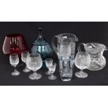 A small collection of glassware to include studio glass, cut glass jugs, drinking glasses,