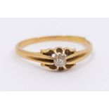 A diamond and 18ct gold solitaire ring, claw set old cut diamond weighing approx 0.15ct, size approx