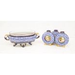 A 19th Century Royal Worcester triple posy vase formed as three conjoined moon flasks each decorated