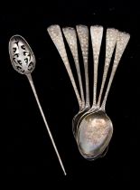 A George III silver mote spoon, the bowl pierced with scrolls, hallmarked London, maker's mark TS?