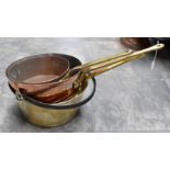 Large collection of brass and copper wares including coal scuttles, pans, kettles, nut roasters,