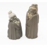 Two Lladro figures of Chinese men