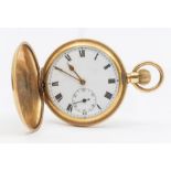 An early 20th century gold plated hunter pocket watch, white enamel dial with roman numeral markers,