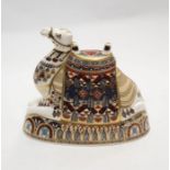 A Royal Crown Derby Camel paperweight, gold octagonal stopper, red factory stamp, date code for