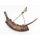 A 19th Century wooden gun powder/shot horn with carved detail