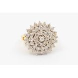 A diamond and 18ct gold cluster ring, round cluster set with round brilliant cut diamonds, total