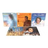 A collection of vinyl lp's to include Merle Haggard, Ronnie Milsap, Burl Ives, Glen Campbell,