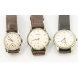 Three vintage steel/white metal cased wristwatches to include a Roamer, Cyma and other, all with