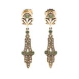 A pair of emerald and seed pearl 9ct gold drop earrings, open work top set with a round cut