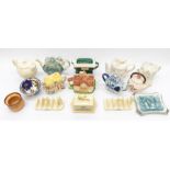 A vintage Lurpak toast racks and butter dish, along with a collection of teapots