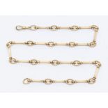 A 9ct gold fancy link chain, comprising alternating rectangular bars bead terminals with open oval