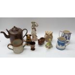 Late 19th Century early 20th Century stone ware plates, figures, money boxes, Lustre wares, and a
