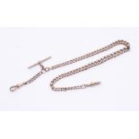 A 9ct rose gold graduated Albert link chain with two swivel clasp and  T bar, each link marked