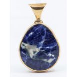 A 9ct gold malachite and sodalite reversible pendant, pear shaped form with large bail to top,