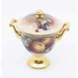 A Coalport hand painted vase with cover by Budd, gilt detail